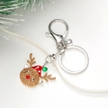 Macro detail of Christmas reindeer keychain with brown rhinestones and red enamel hat - Reindeer (Silver) (D2858)