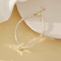Elegant natural pearl bracelet with a gold bead accent and adjustable clasp - Natural Pearl Gold Ball Bracelet