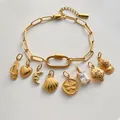 Gouden roestvrijstalen bedelarmband met diverse DIY-hangers - Goud