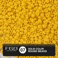 Vibrant solid yellow 4mm glass round beads with a polished baked paint finish - 07