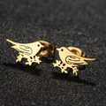 Minimalist golden bird stud earrings on branches with a brushed matte black background - Bird / Gold