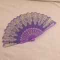 Elegant purple lace folding fan with ornate gold patterns and plastic ribs for dancing - Purple