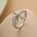 Silver bow knot open ring featuring sparkling micro-pave cubic zirconia accents - Adjustable Open / Silver Bow (13669)