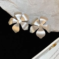 Minimalist silver matte flower stud earrings with a sleek metallic frosted finish - Silver
