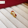 Macro shot of gold plated wave ring with red enamel finish in a jewelry gift box - Irregular Wave Streamline Red Open Ring (Gold Plated)