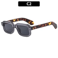 Trendy square grey sunglasses with stylish tortoiseshell patterned temples for unisex wear - Translucent Grey Frame Grey Lens
