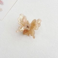 Champagne pearlescent butterfly hair claw clip with a marble texture finish - Waterdrop Wing Iridescent Yellow