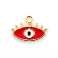 Macro view of a red evil eye charm with gold metal eyelashes for DIY jewelry making - 10pcs Red Eyelash Evil Eye Alloy Pendants
