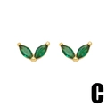 Elegant gold leaf studs featuring two marquise emerald green zircons in a V-shaped design - Green Leaf
