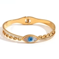 Elegant 18K gold-plated bangle with blue evil eye centerpiece and micro-set zirconia - Cut Chain Cross Shell Eye