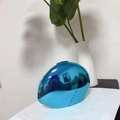 Detailed top view of the egg-shaped metallic blue evening bag with a silver clasp closure - Blue (Lined)