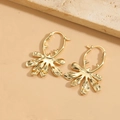 Irregular geometric leaf earrings in gold finish with textured metal details - Irregular Flower Style