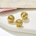 Detail of retro hollow round golden alloy beads with diamond patterns for DIY jewelry - Style 3