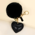 Elegante portachiavi nero in finta pelliccia con ciondolo a cuore e dettagli in metallo oro - Nero