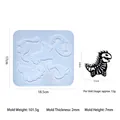 Détail macro du moule en silicone de squelette de dinosaure pour porte-clés en résine - Moule en Silicone Squelette de Dinosaure 01 / Rose bonbon