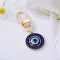 Porte-clés œil bleu en métal doré avec finition émail et strass bleu foncé brillant - Oeil Bleu Royal Strass