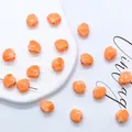 Orange shell-shaped ceramic beads with silver glitter edges for DIY jewelry making - 12mm / Orange Red