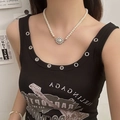 Elegant white pearl choker necklace with a central planetary pendant on a fashion model - Planet Orb Design Pearl Clavicle Chain (L0058XB) / Milky White