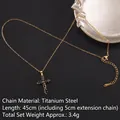 Golden titanium steel cross necklace featuring inlaid black square zircon crystals - Cross No.43 Gold (A1221)