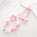Pink and white beaded phone charm strap with bow and star accents for wrist protection - Pink and White Beaded Bow (k891) / Pink and White Bow Phone Chain