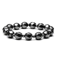 Macro detail of men's bracelet with faceted hematite beads and metallic spacers - Faceted Hematite Beads Combination