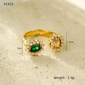 Detailed macro view of gold adjustable ring with green stone, zirconia and pearls - Green & Champagne Gem With Pearls Style (NMSR-H334-2)