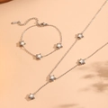 Detailed view of silver star pendant necklace and bracelet set in polished stainless steel - Steel Star Jewelry Set (H114)