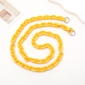 Macro detail of lemon yellow acrylic bag strap chain with silver metal spring rings - Yellow