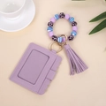 Llavero de pulsera de cuentas de silicona moradas con tarjetero de cuero PU y borla - Púrpura