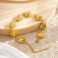 18k vergoldetes Muschel-Wellenarmband mit verstellbarem Karabinerverschluss - Muschel & Herz Stil