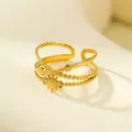 Detail view of 18K gold layered ring with sunburst design and size measurements - Three-layer Thin Starburst