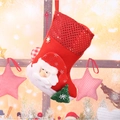 Detail of red Christmas stocking with sequined Santa Claus and green tree decorations - Medium Sequin Sock - Santa