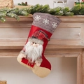 Christmas stocking with 3D Santa Claus and plaid hat hanging on a festive wooden mantle - Snowflake Plaid Santa Stocking