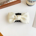 Elegant cream white satin bow hair claw clip for women shown on a minimalist wooden tray - Satin Double Sided Bow Claw Clip / White