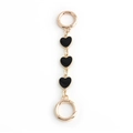 Golden handbag chain strap featuring three black enamel heart charms and ring clasps - Black Triple Heart
