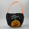 Black plush Halloween trick or treat bag with orange pumpkin face and handle - Black Crooked Pumpkin