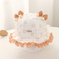 Détail du chapeau bébé avec imprimé cerise, nœud orange et bord volanté à carreaux - 48cm (5-20 mois) / Orange