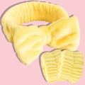 Close-up of a soft yellow coral fleece headband with bow and matching wristband set - Yellow (3-Piece Set)