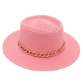 Detailed view of a pink straw boater hat featuring a decorative gold acrylic chain strap. - One Size / Pink (with Acrylic Chain Decor)