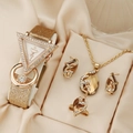 Luxurious gold jewelry set with triangle quartz watch and sparkling crystal stones - Champagne Peacock Set