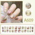 Macro detail of A609 press-on nails featuring earth tone cow print and gold rim designs - Earth Tone Cow Pattern Gold Edge Style (A609)