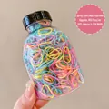 Jar of 800 colorful elastic hair bands in spring pastel tones for women and kids - Small Thickened Spring Color 800 Pcs (Jar)