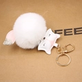 White faux fur ball keychain with pink fox leather pendant and gold sequins - White