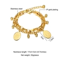 Detail view of gold-plated stainless steel layered bracelet with Virgin Mary pendants - Gold