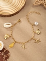 Golden ocean theme bracelet featuring seashell, starfish, and pearl charms for women - Letter X(X)