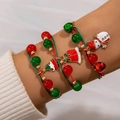 Detailed view of Christmas layered beaded bracelet with snowman and bell charms on wrist - Multi-layer Xmas Charms(25696 red green)