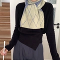 Detail of light green knit scarf with blue plaid pattern and handmade label tag - Blue Beige