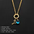 14K gold plated stainless steel necklace with heart initial and a blue gemstone - Letter P
