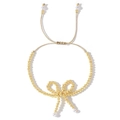 Bracciale a sfere placcato oro 18K regolabile con fiocco e accenti di perle bianche - Fiocco Dorato con Accenti in Perla