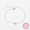 925 sterling silver bracelet featuring a polished letter R pendant with sparkling zircon crystals - Letter R / White Gold